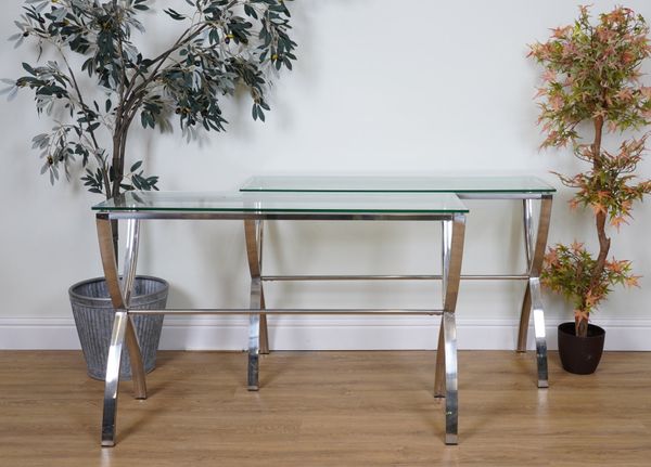 A PAIR OF CHROME AND GLASS RECTANGULAR CONSOLE TABLES (2)