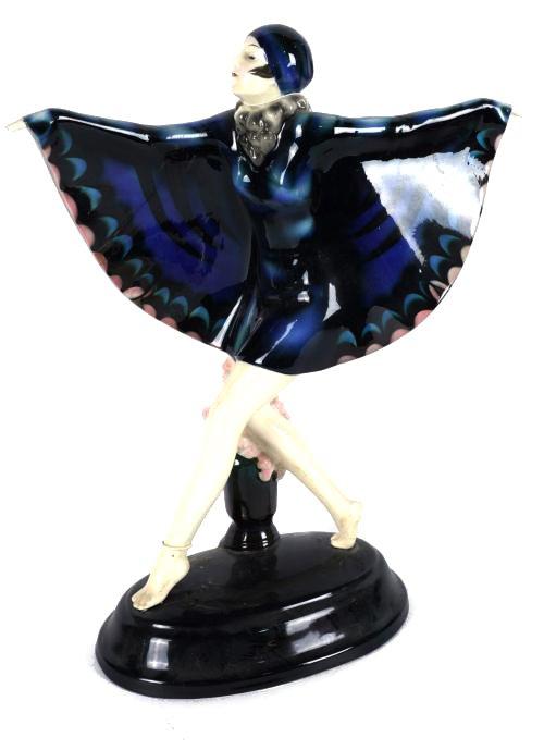 `THE CAPTURED BIRD' A GOLDSCHEIDER POTTERY FIGURE OF A DANCER