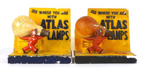 ‘ATLAS LAMPS’, A PAIR OF EARLY 20TH CENTURY PLASTER ADVERTISING FIGURES (2)