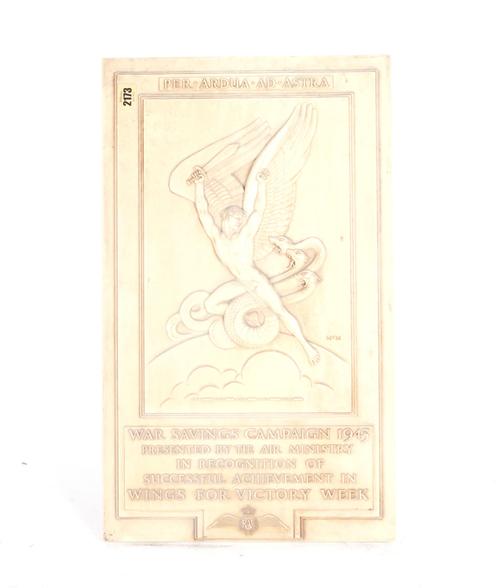 ‘WINGS FOR VICTORY WEEK’ AN EARLY 20TH CENTURY WHITE BAKELITE PLAQUE