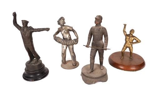 FOUR STATUETTES INCLUDING A SAILOR (4)