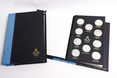 A SET OF FIFTY SILVER PROOF MEDALLIONS