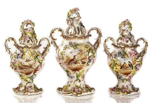 A COALBROOKDALE-TYPE GARNITURE OF THREE PORCELAIN TWO-HANDLED VASES AND COVERS (6)