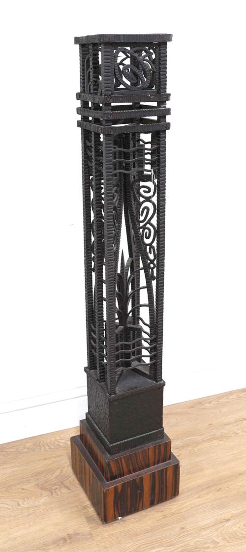AN ART DECO WROUGHT-IRON TORCHERE STAND IN THE MANNER OF PAUL KISS