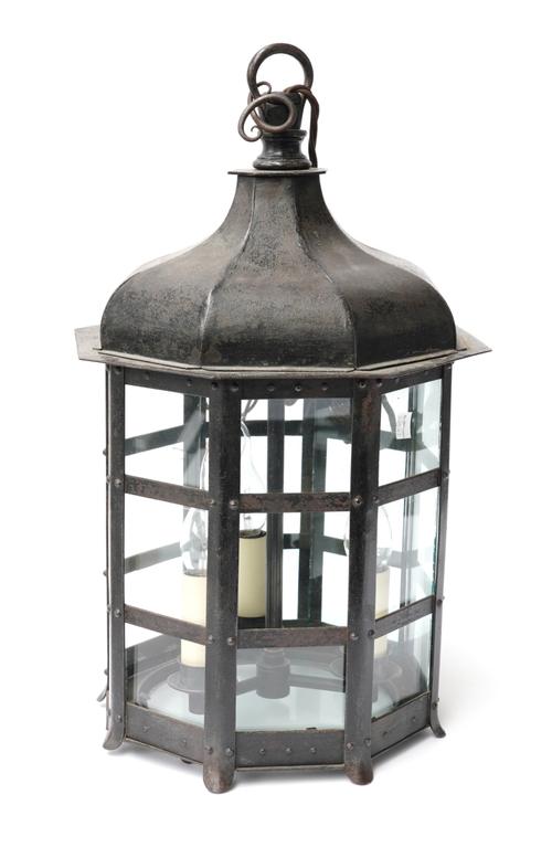 AN ARTS & CRAFTS IRON OCTAGONAL HANGING LANTERN