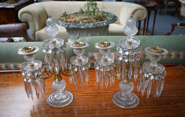 A PAIR OF REGENCY CUT-GLASS AND ORMOLU MOUNTED TWIN LIGHT CANDELABRA (2)