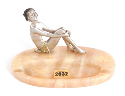 A PAIR OF ART DECO GILT AND PAINTED METAL FIGURAL BOOKENDS (3)