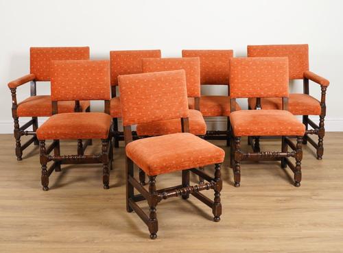 A SET OF EIGHT CHARLES II STYLE OAK FRAMED SQUARE BACK DINING CHAIRS (8)
