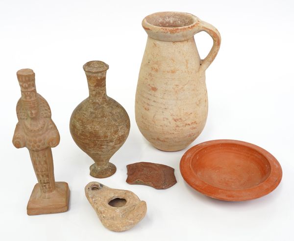 A ROMAN SINGLE HANDLE TERRACOTTA JUG TOGETHER WITH AN AMPHORA SHAPED TERRACOTTA VESSEL AND TEN OTHER ITEMS (10)