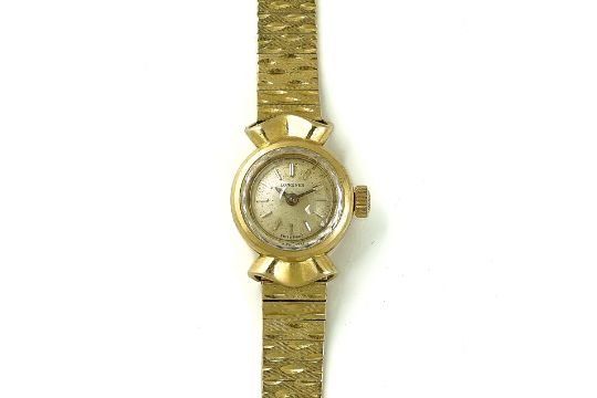 A LONGINES GOLD LADY'S BRACELET WRISTWATCH