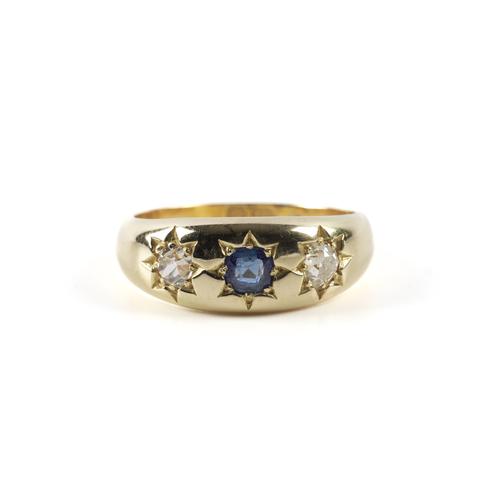 AN 18CT GOLD, SAPPHIRE AND DIAMOND THREE STONE RING