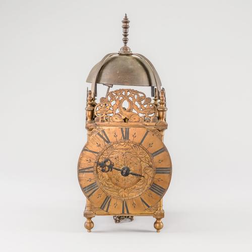 A BRASS LANTERN CLOCK