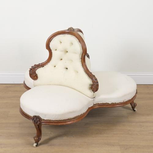A VICTORIAN WALNUT FRAMED LOVE SEAT/CONVERSATION CHAIR