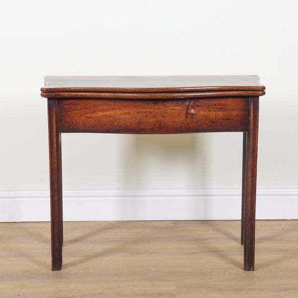 A GEORGE III MAHOGANY SERPENTINE FOLD-OVER TEA TABLE