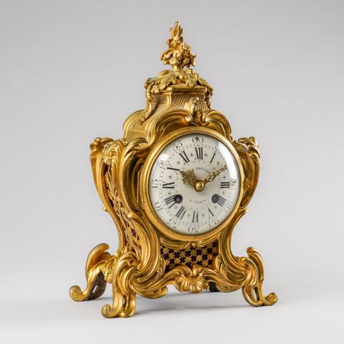 A NAPOLEON III  ORMOLU MANTEL CLOCK