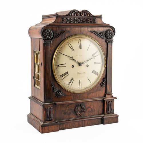 A VICTORIAN ROSEWOOD STRIKING BRACKET CLOCK