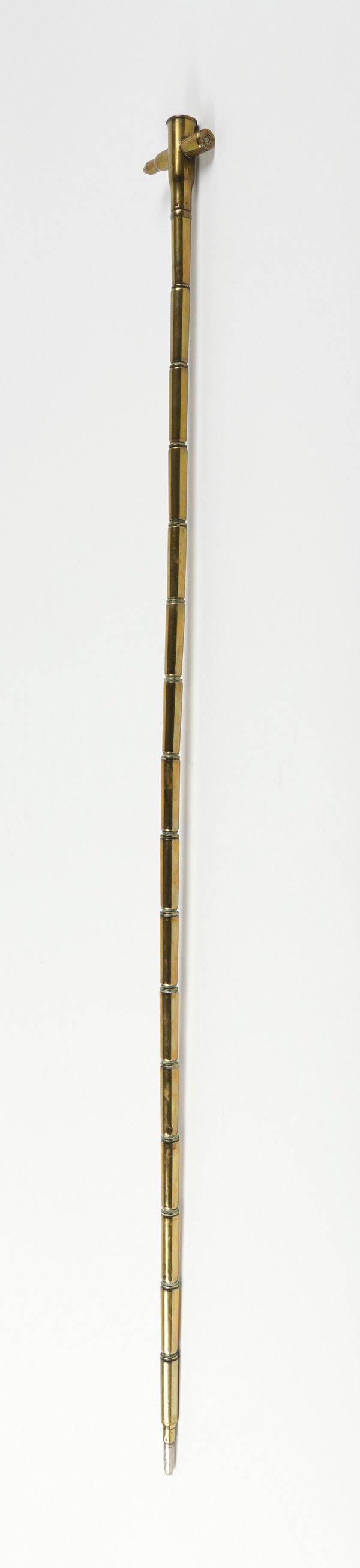 TRENCHART: A WWI BRASS CARTRIDGE WALKING CANE