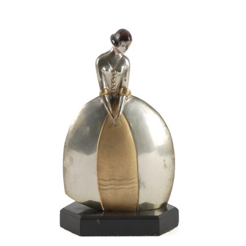 GANU H. GANTCHEFF: AN ART DECO SILVER AND PARCEL GILT BRONZE FIGURE OF A DANCER