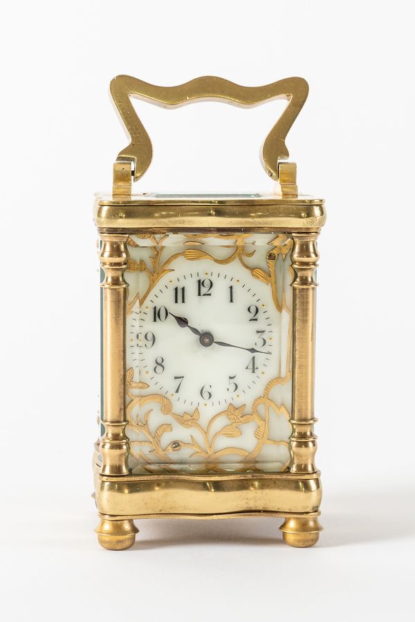 A FRENCH BRASS MINIATURE CARRIAGE TIMEPIECE