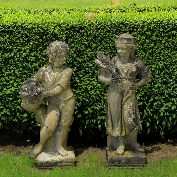 A PAIR OF RECONSTITUTED STONE FIGURES OF CHILDREN (2)