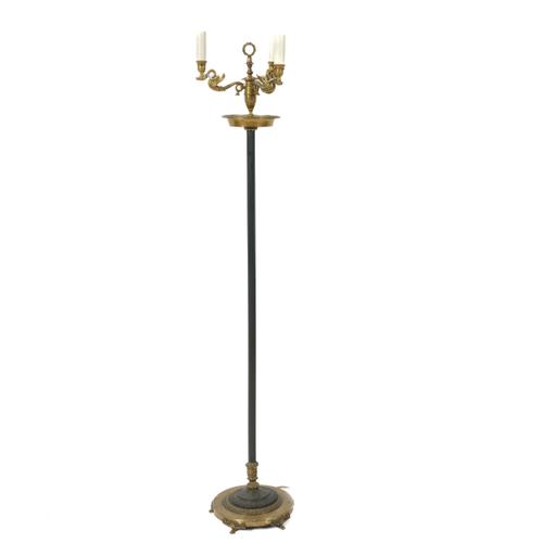 AN EMPIRE BOUILLOTTE STYLE GILT AND PATINATED METAL THREE BRANCH FLOOR LIGHT
