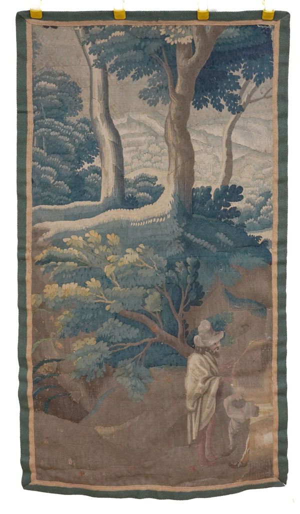 A FLEMISH VERDURE TAPESTRY FRAGMENT OR SECTION