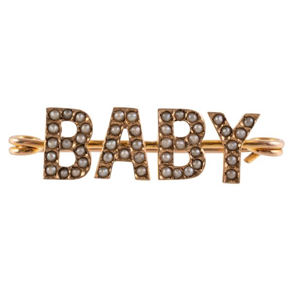 A MURRLE BENNETT SEED PEARL BABY BROOCH