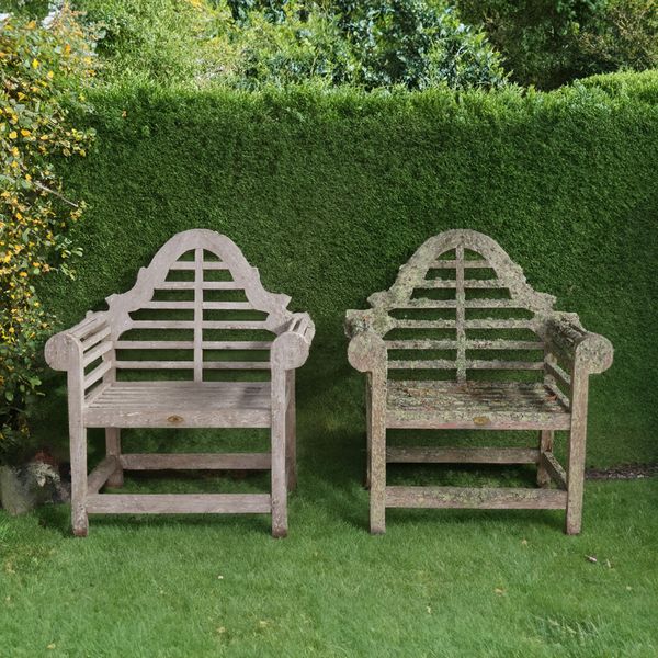 LUTYENS; A PAIR OF HARDWOOD GARDEN ARMCHAIRS (2)