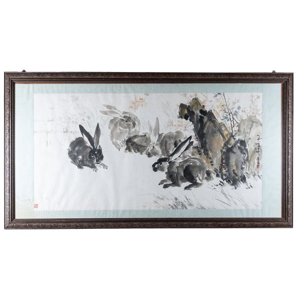 A LARGE CHINESE PRINT OF HARES BESIDE ROCKS