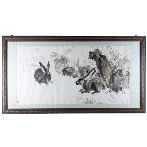 A LARGE CHINESE PRINT OF HARES BESIDE ROCKS
