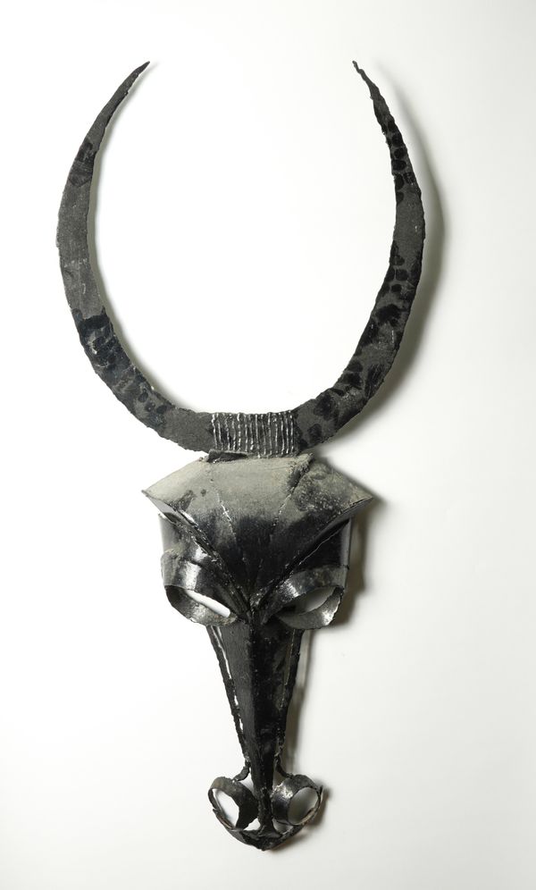 A BLACK PAINTED WROUGHT IRON SKULL TROPHY OF AN ANTELOPE (2)