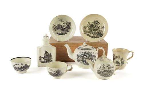 A GROUP OF BLACK PRINTED CREAMWARES (11)