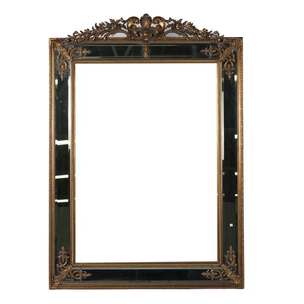 A LARGE GILT FRAMED MARGINAL WALL MIRROR