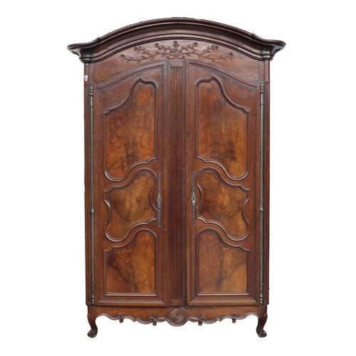 AN 18TH CENTURY FRENCH WALNUT TWO DOOR ARMOIRE