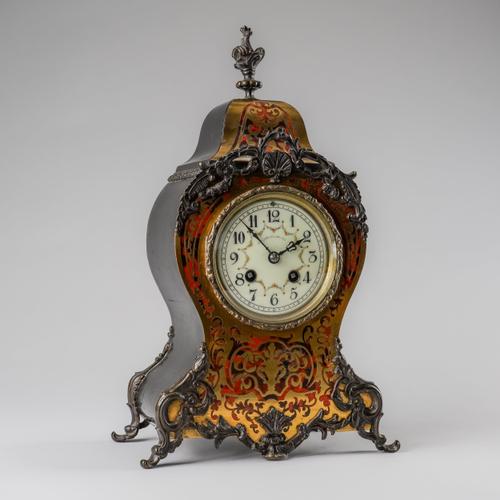 A GILTMETAL-MOUNTED BOULLE WORK EBONISED MANTEL CLOCK