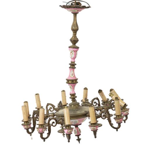 A SEVRES STYLE PINK PORCELAIN AND GILT LACQUERED BRASS TWELVE LIGHT CHANDELIER