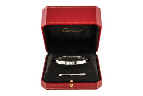 A WHITE GOLD CARTIER LOVE BANGLE, 10 DIAMONDS, BOXED (3)