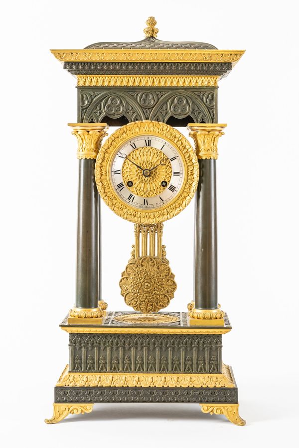 A LOUIS PHILIPPE ORMOLU AND PATINATED BRONZE PORTICO CLOCK