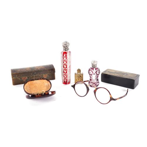 TWO SILVER MOUNTED OVERLAID GLASS SCENT BOTTLES (6)