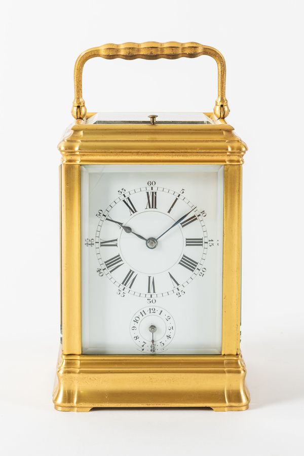 A FRENCH GILT BRASS GORGE CASED STRIKING AND REPEATING CARRIAGE CLOCK