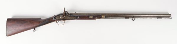 A PERCUSSION ACTION RIFLE