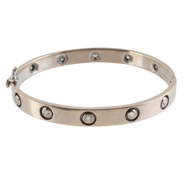 A WHITE GOLD AND DIAMOND SET BANGLE
