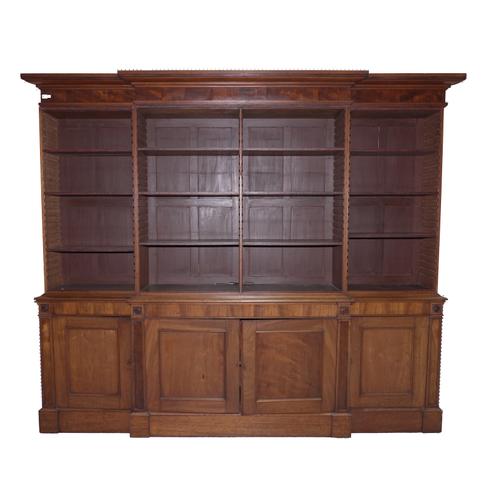 A LATE GEORGE III MAHOGANY FLOORSTANDING BREAKFRONT BOOKCASE CUPBOARD