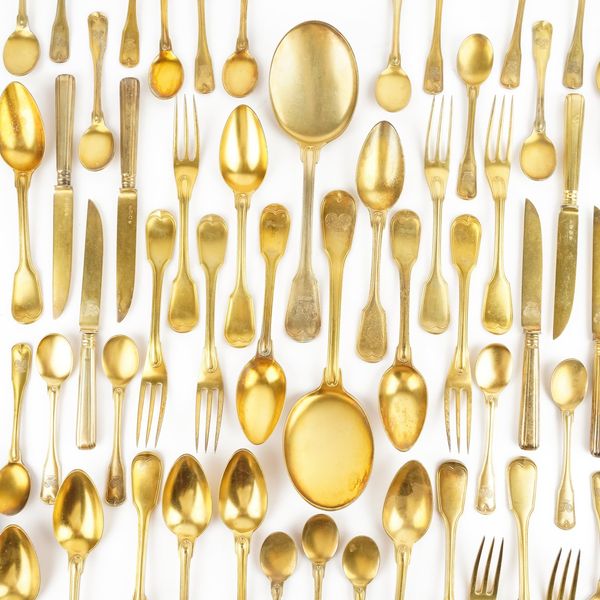 A CONTINENTAL SILVER GILT PART TABLE SERVICE (122)