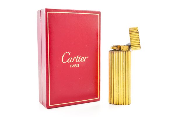 A GOLD PLATED CARTIER GAS LIGHTER