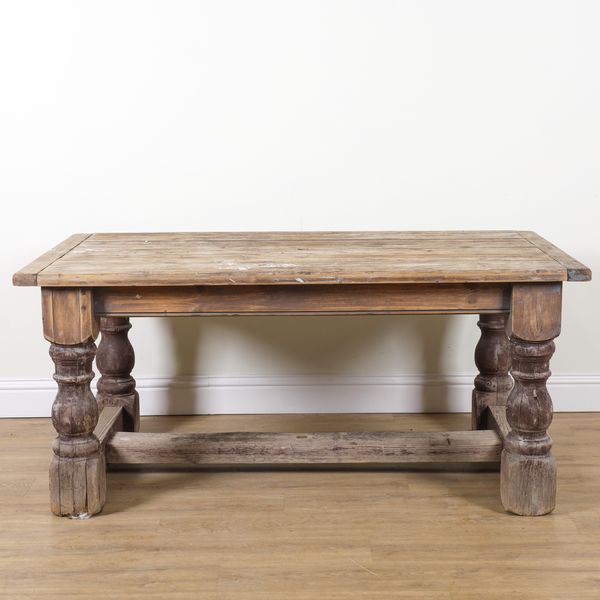 A STAINED PINE RECTANGULAR GARDEN TABLE