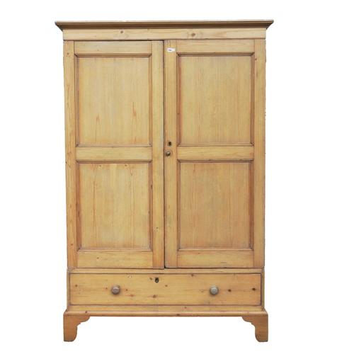 A GEORGE III PINE CHANNEL ISLAND KNOCKDOWN WARDROBE