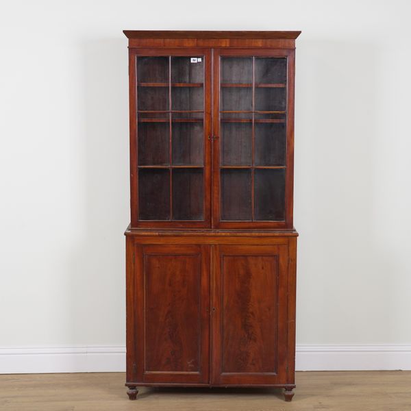 A 19TH CENTURY MAHOGANY BOOKCASE CUPBOARD