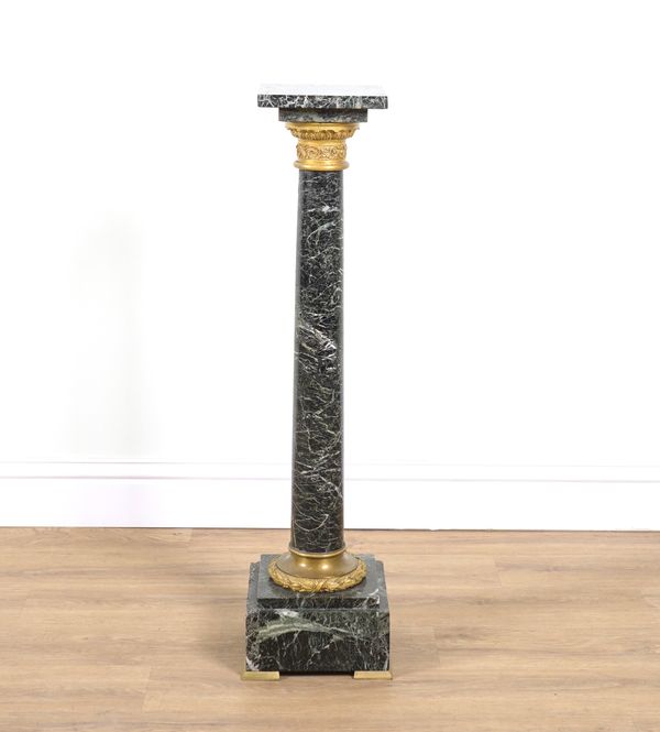 A GILT-METAL MOUNTED VERDE ANTICO MARBLE PEDESTAL COLUMN