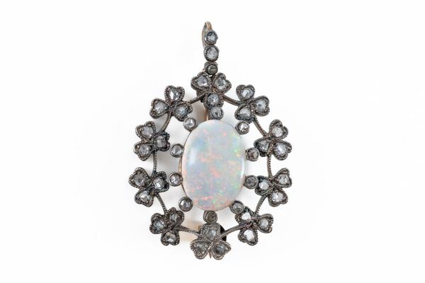 AN OPAL AND ROSE CUT DIAMOND PENDANT BROOCH